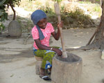 Cecile pounding baobab seeds